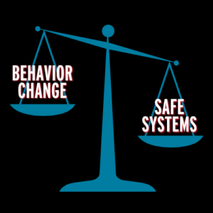 A weighted scale icon with "behavior change" shown to have less weight than "safe systems."